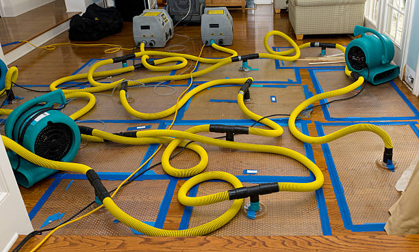 Professional Storm Water Damage Restoration technician working in Hewitt, NJ